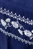 rectangular blue embroidered tablecloth with white flowers stitching detail