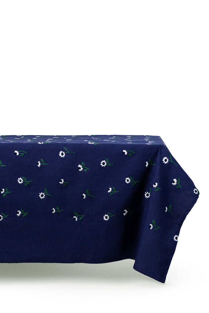 rectangular blue tablecloth with white daisies side view