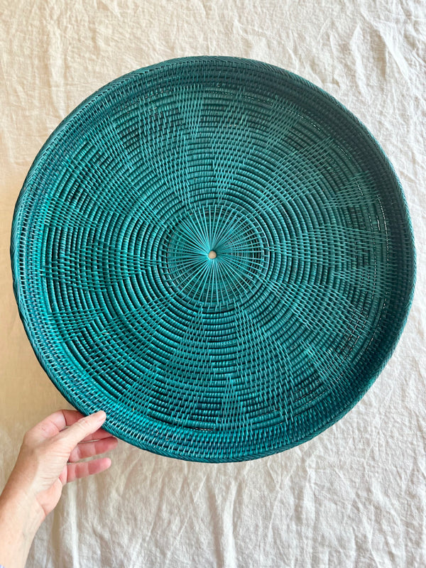 green round woven tray thirty inches top view
