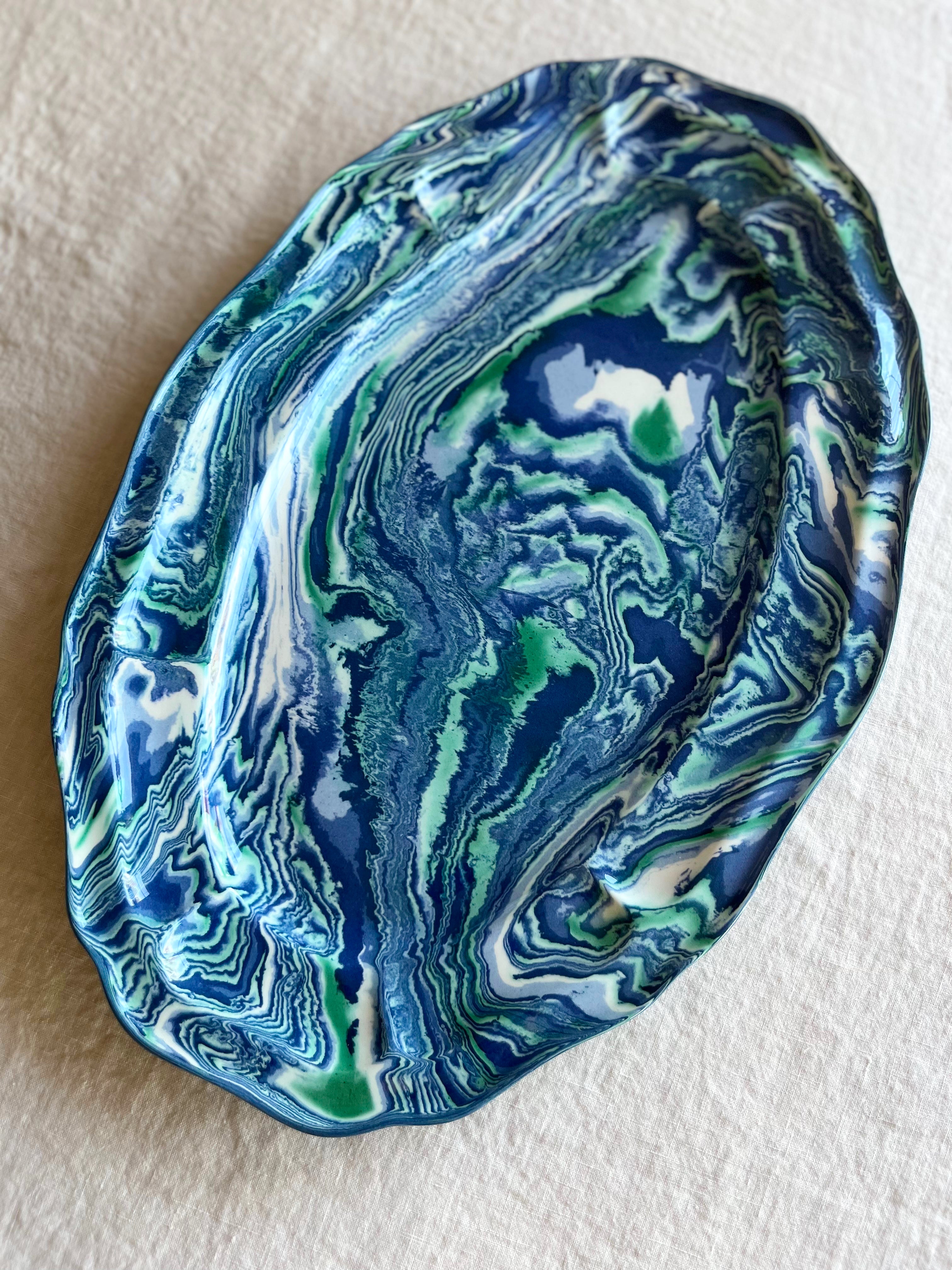 blue terre Melee scalloped platter vertical angled view