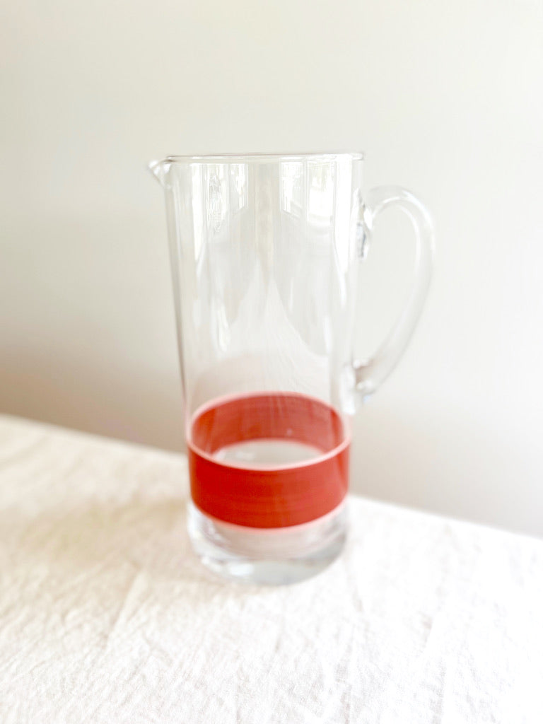 glass pitcher with hand painted red and pink stripes  detail view