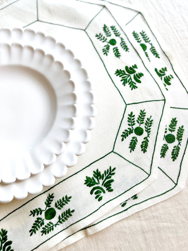 hand painted white salad plate with scalloped edge in placesetting