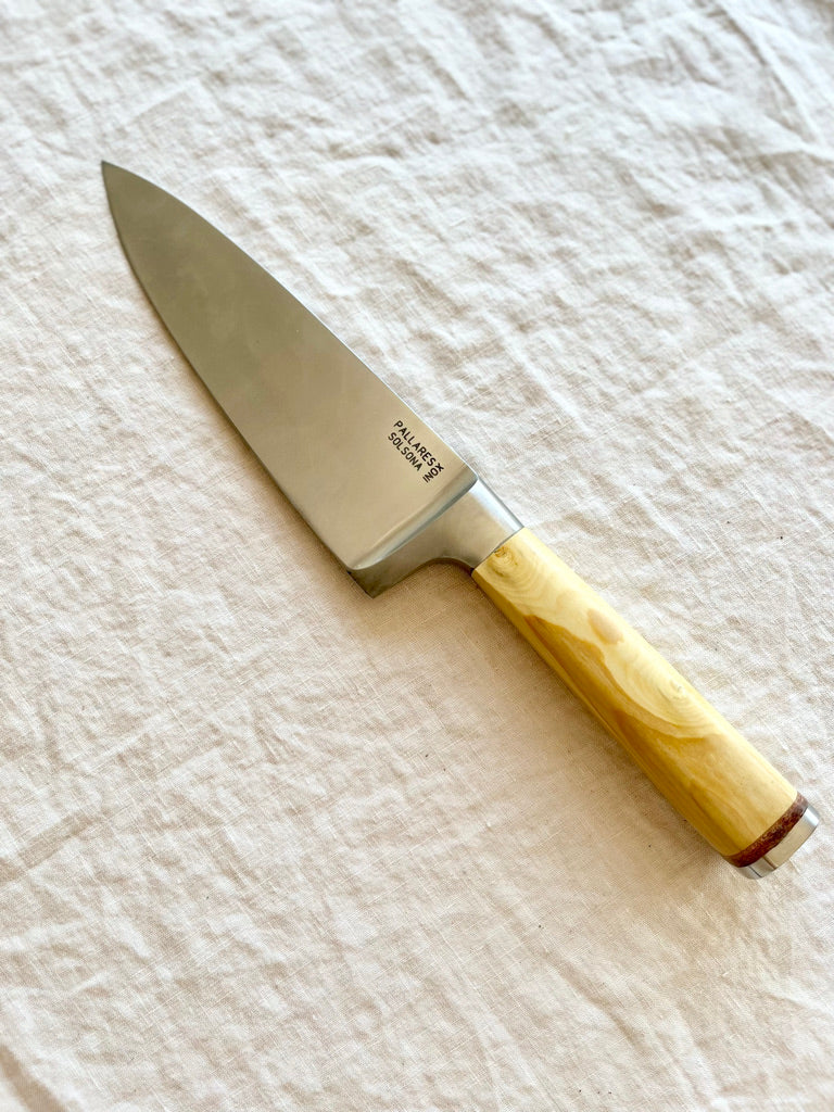 chef knife with boxwood handle on white table by pallares solsona 15cm