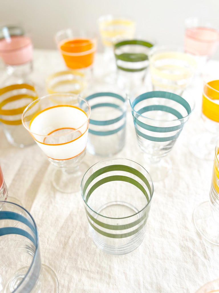 hand painted wine glass with two green stripes grouped with other color options