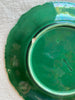 green wedgwood copeland majolica dessert plate small chip on base of plate