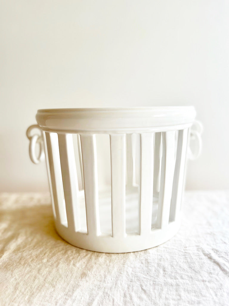 white openwork jardinere planter