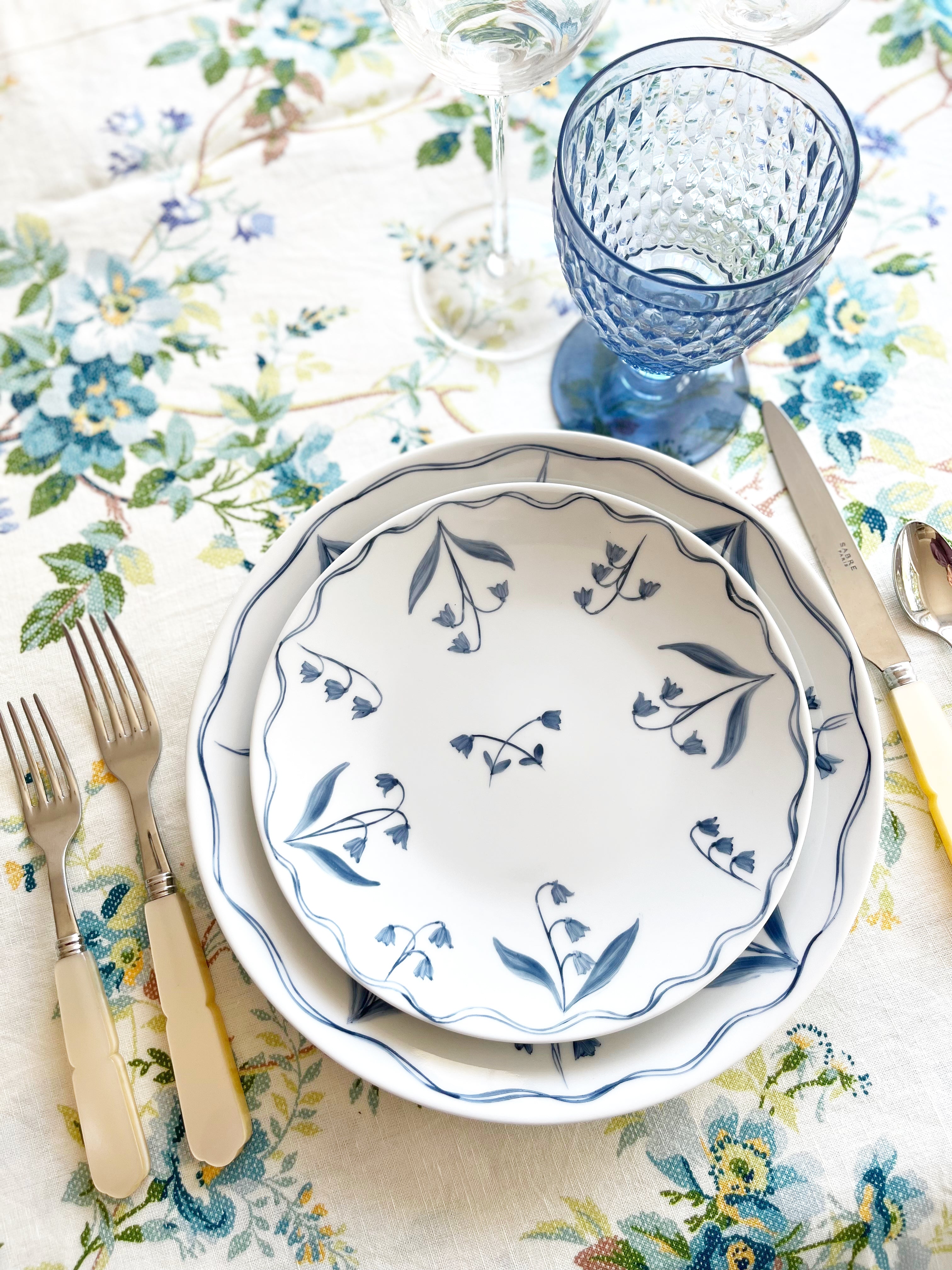blue and white floral hand painted Limoges porcelain salad plate with placesetting