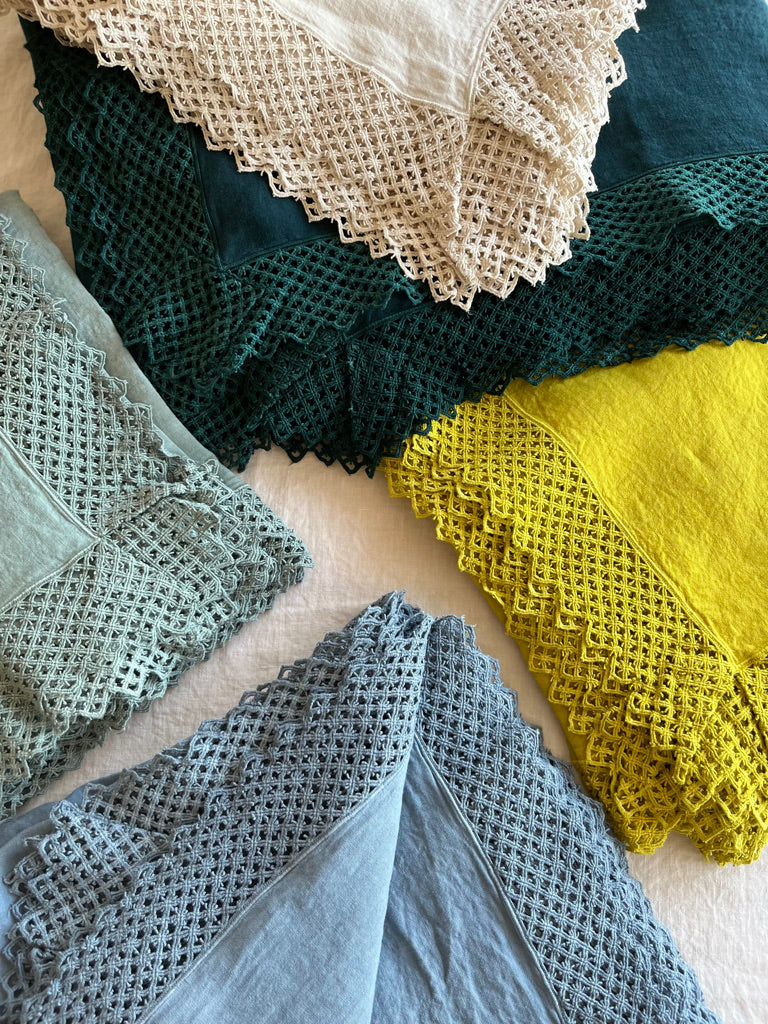 Yellow Milano Macrame Tablecloth shown with assorted colors