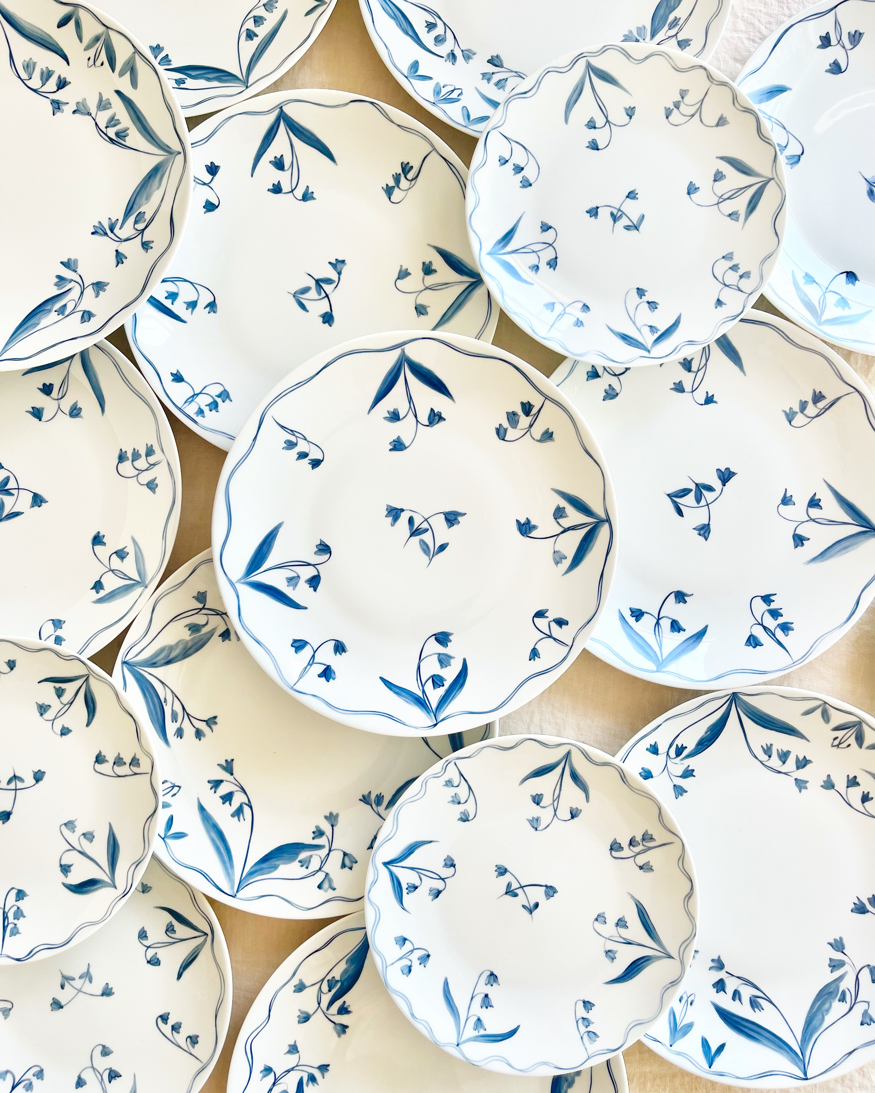 blue and white floral hand painted limoges porcelain dinner plate in group