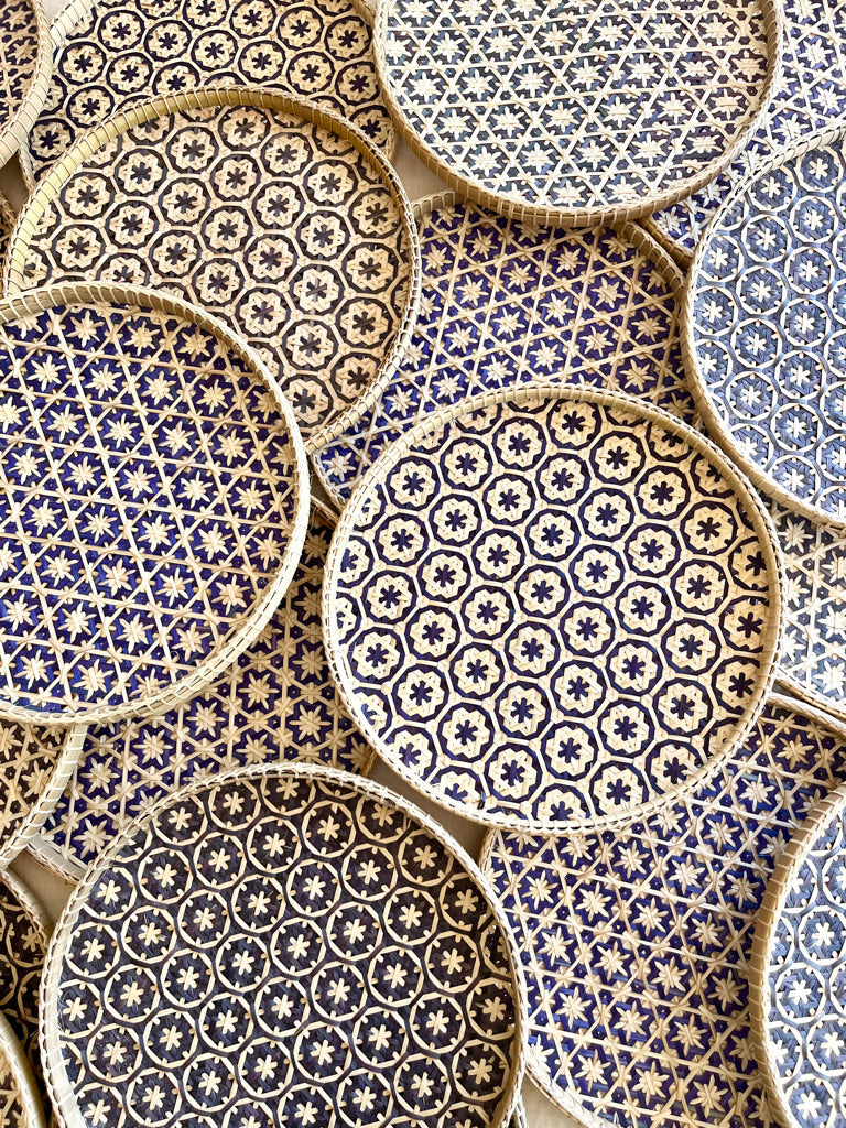 light tan woven tray with navy blue mosaic flower pattern 12 inches in group