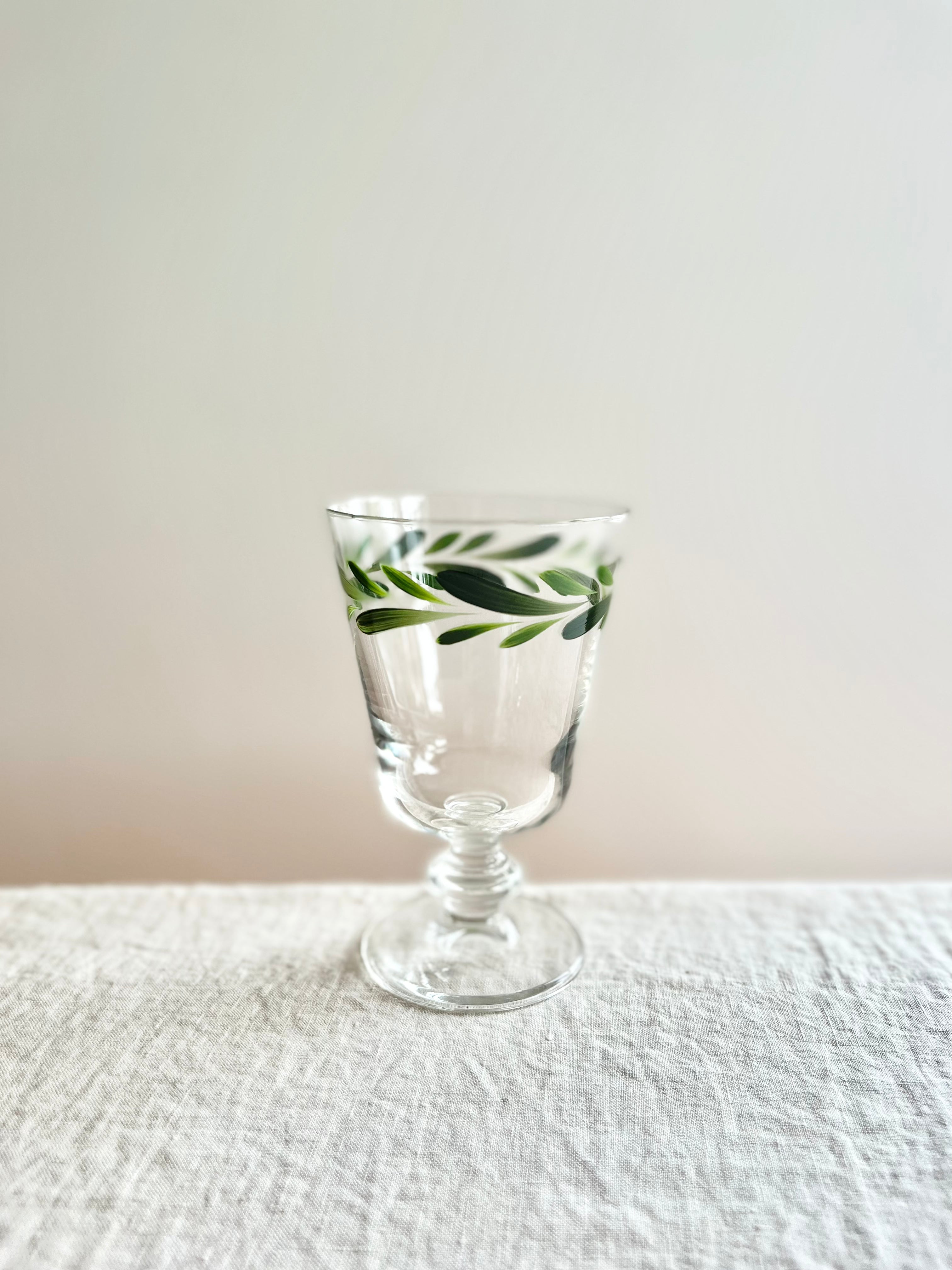 hand painted wine glasses with dark green leaf pattern horizontal leaf on rim