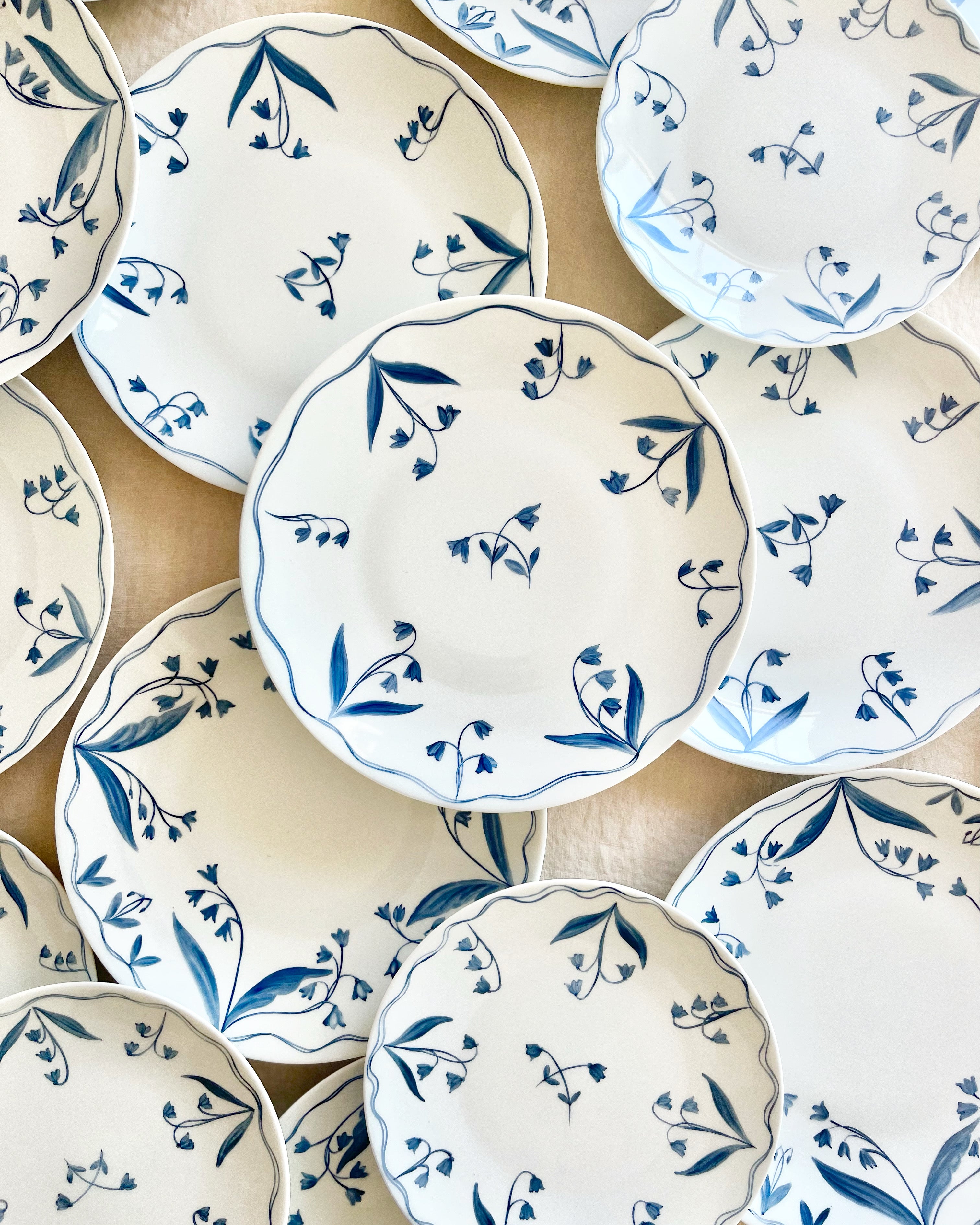 blue and white floral hand painted Limoges porcelain salad plate detail view