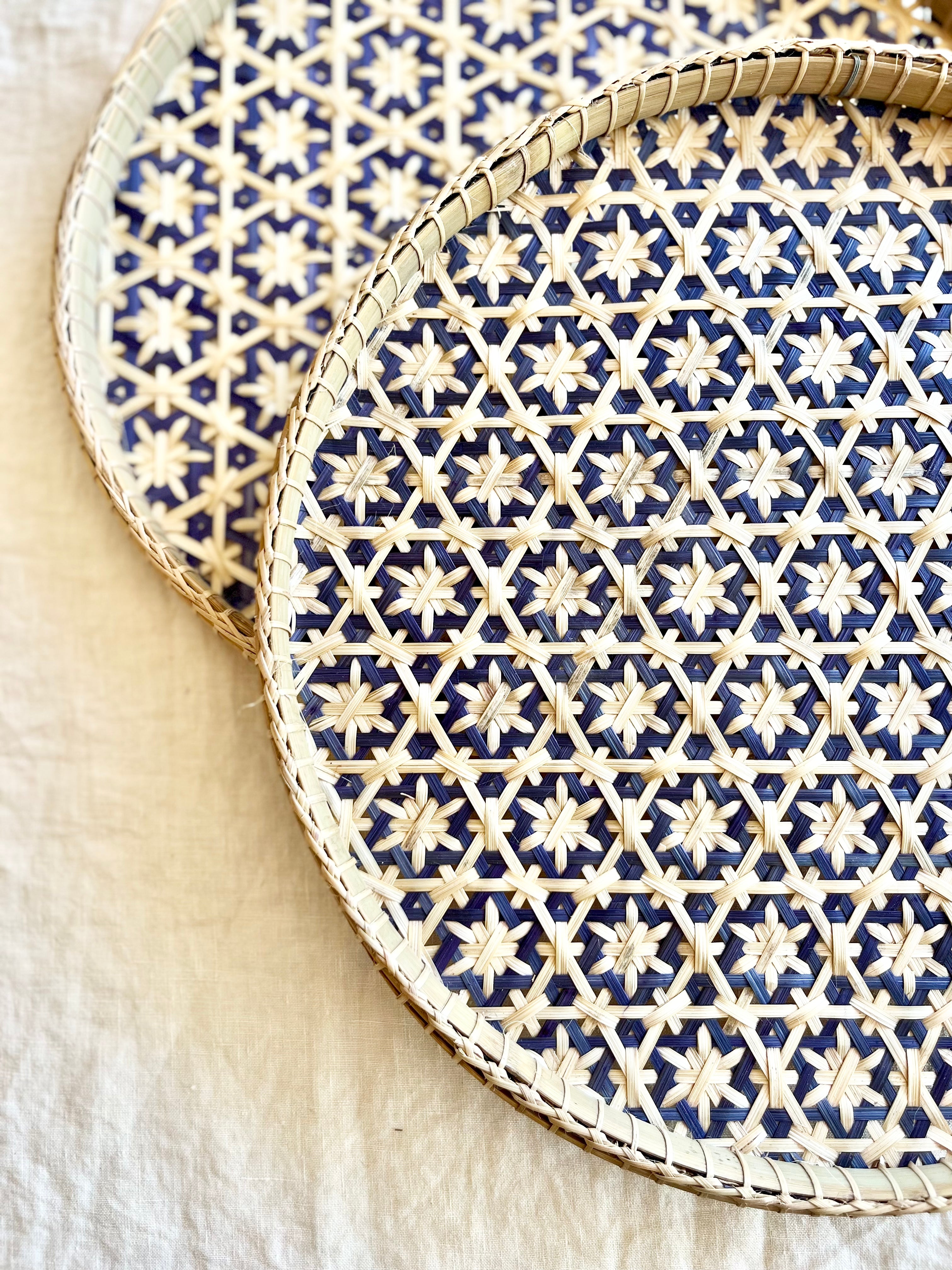 light tan woven tray with navy blue mosaic star pattern 12 inches detail view