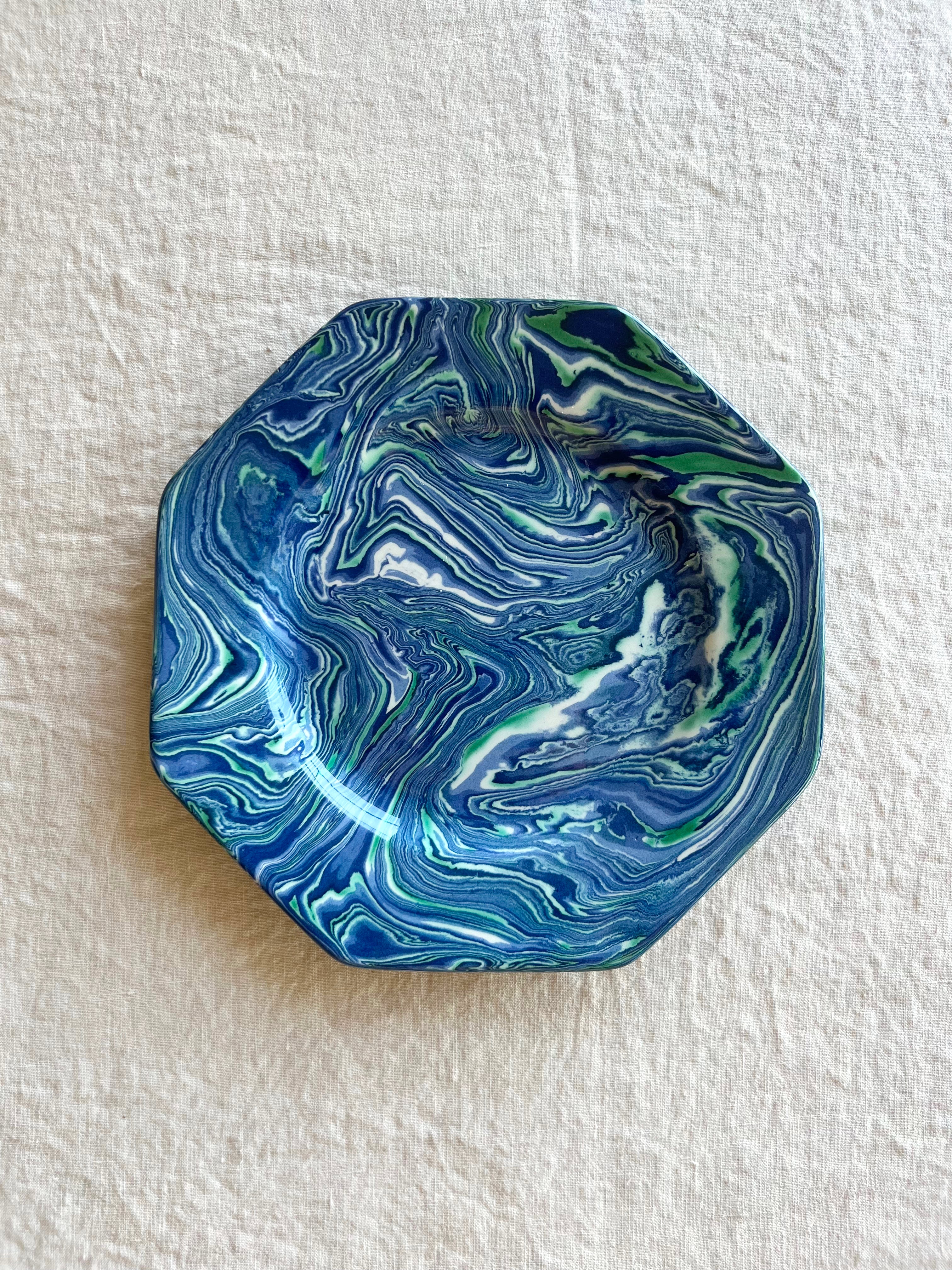 octagonal salad plate with blue green and white swirl pattern 9.75 inches in diameter on linen