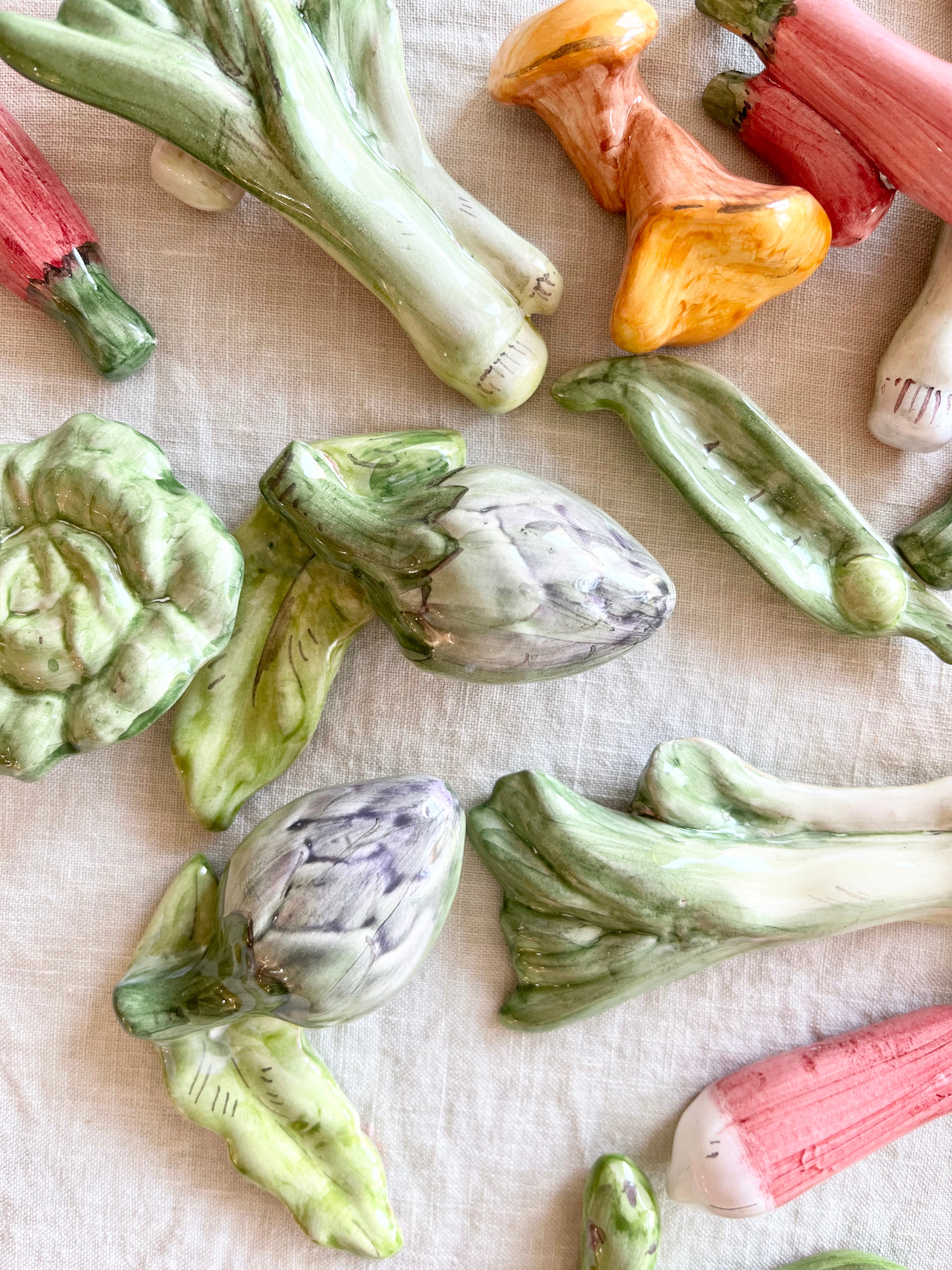 vegetable shaped ceramic knife rests detail on white plate 2.5 inches long detail view