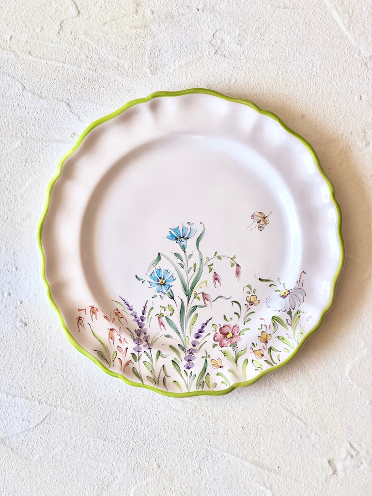 flower salad plates with green edge on white table