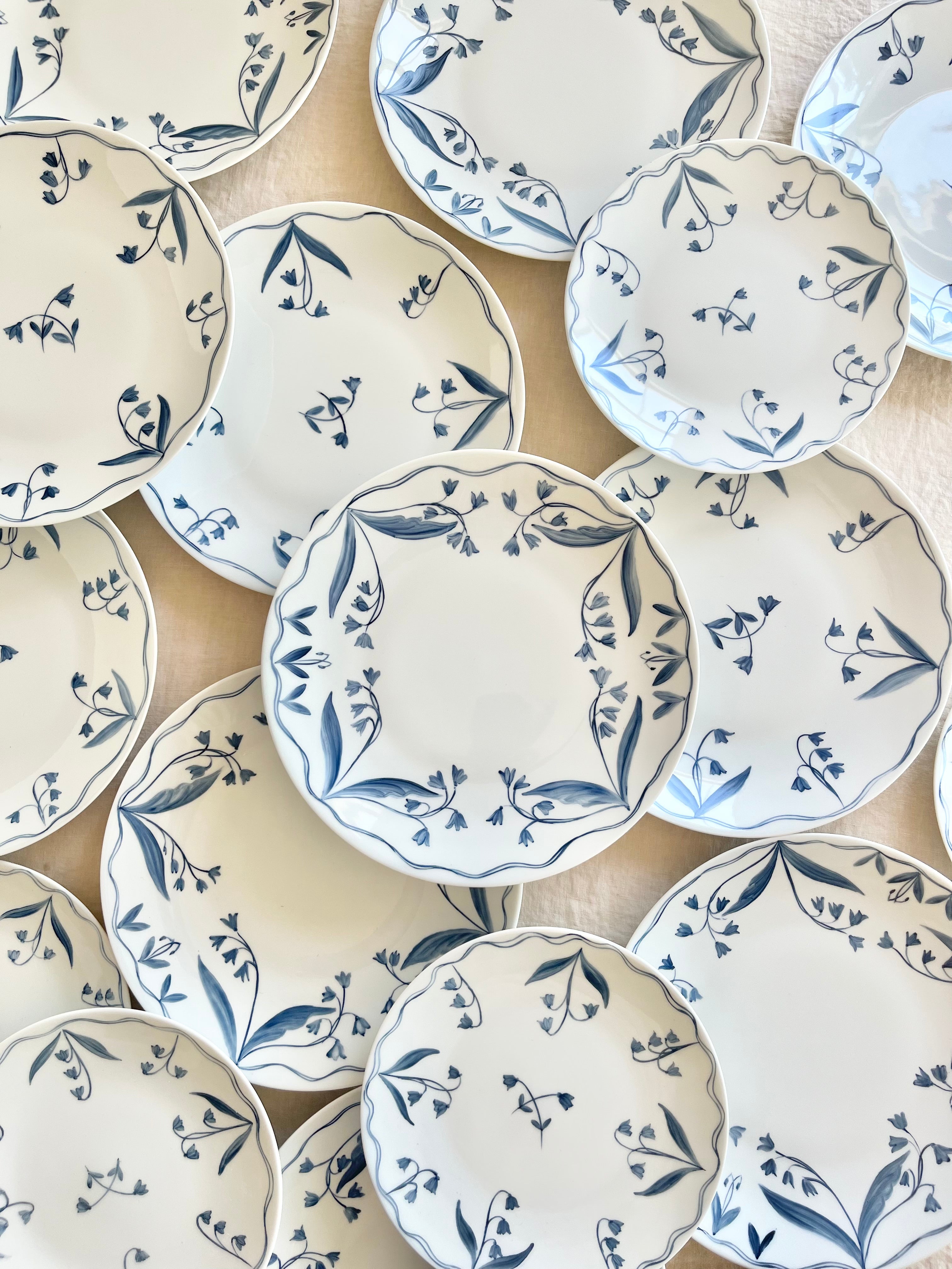 blue and white floral hand painted limoges porcelain dinner plate in group