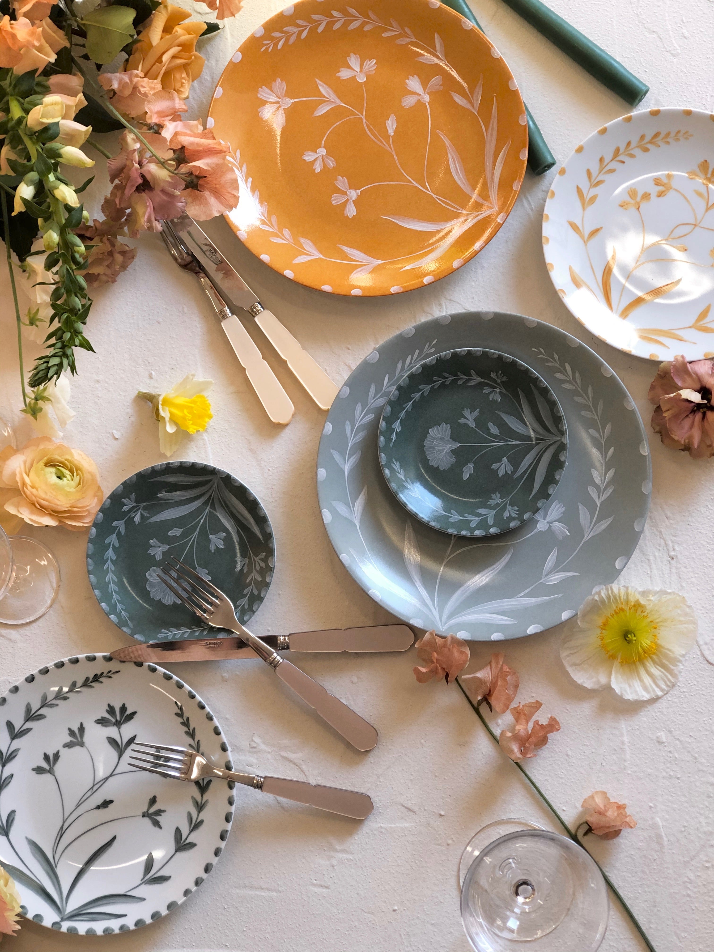 white salad plate with yellow floral pattern in tablescape