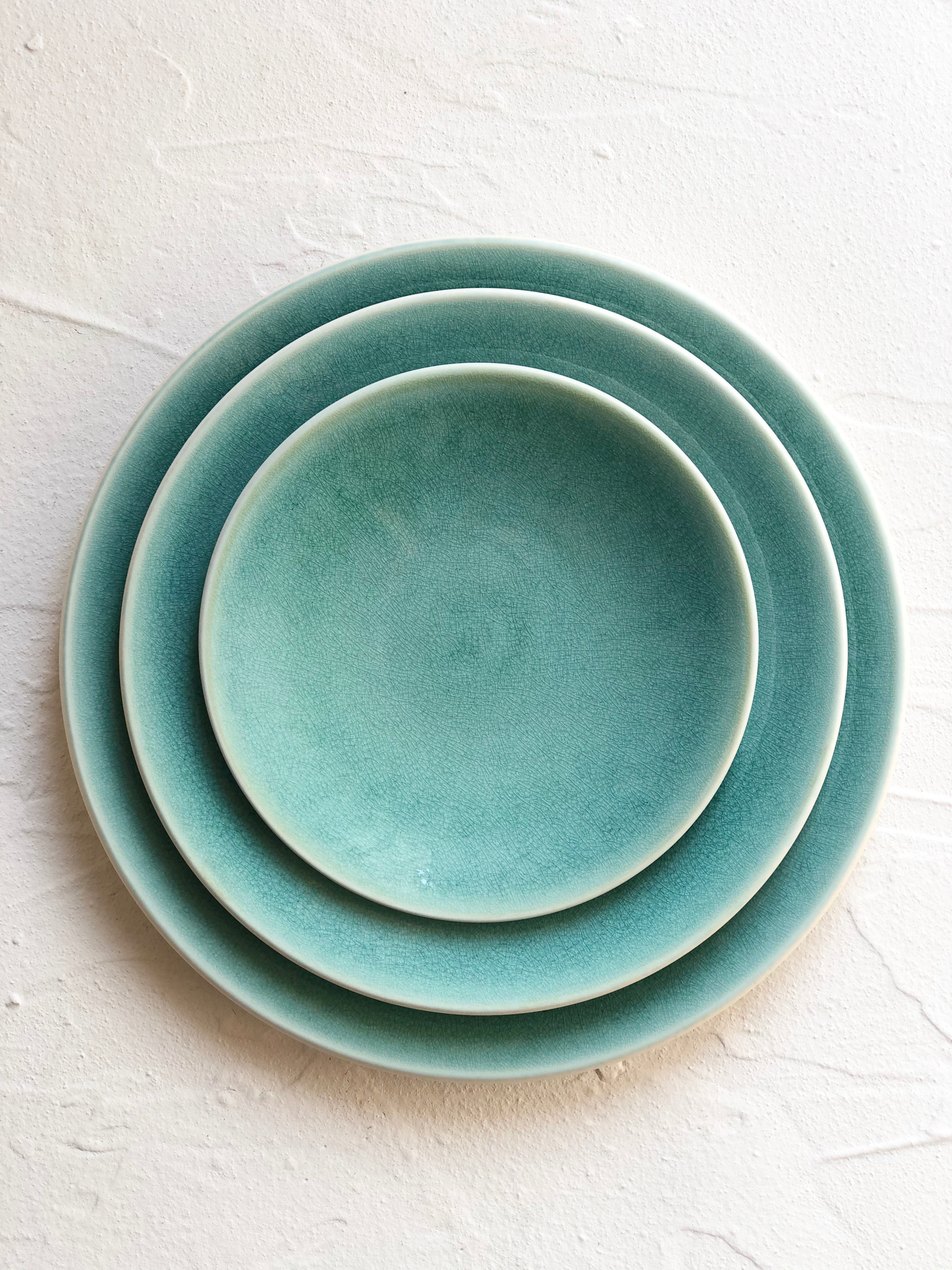 green reactive glaze salad plate with dinner plate