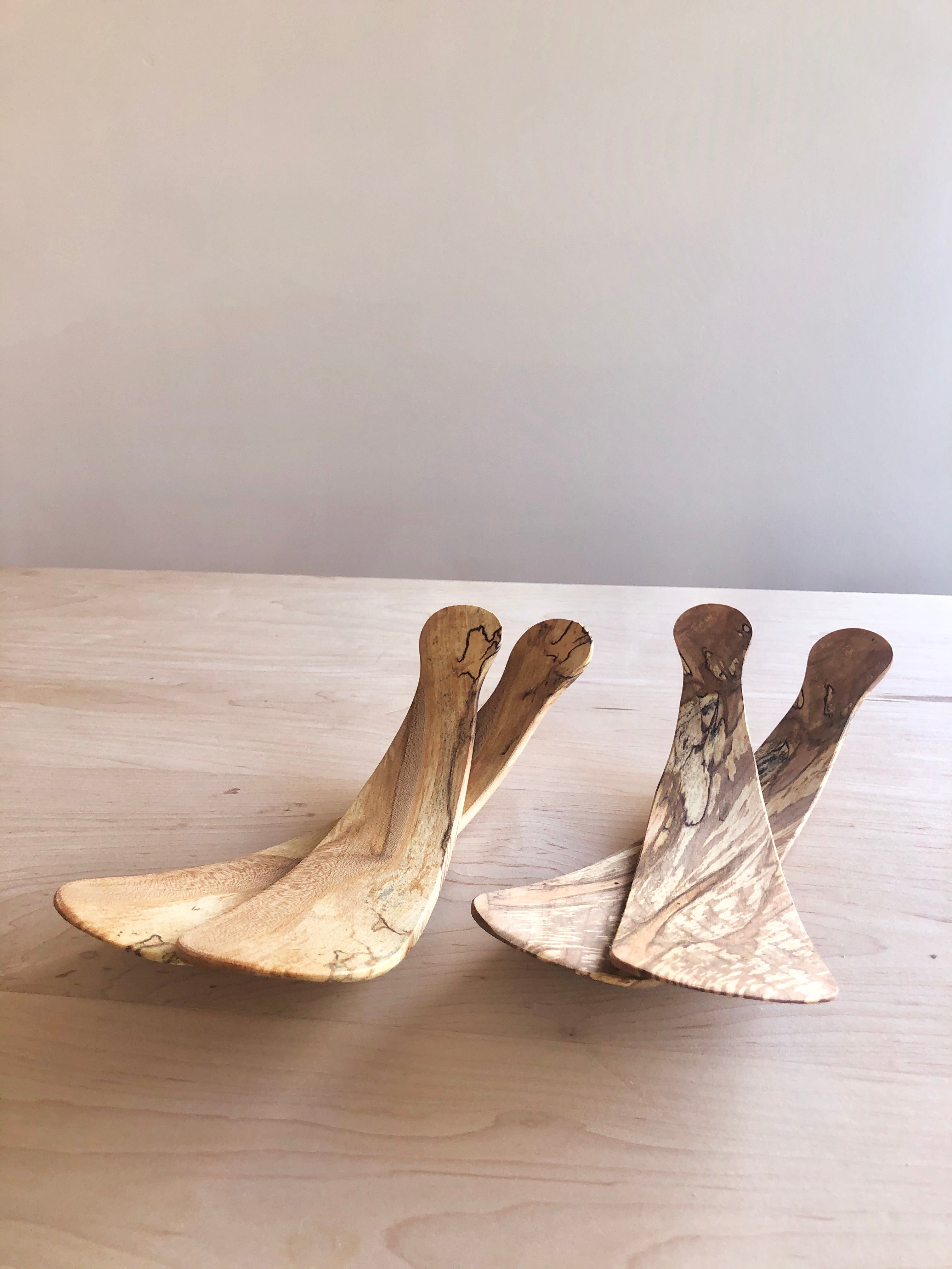 wooden salad servers angle view