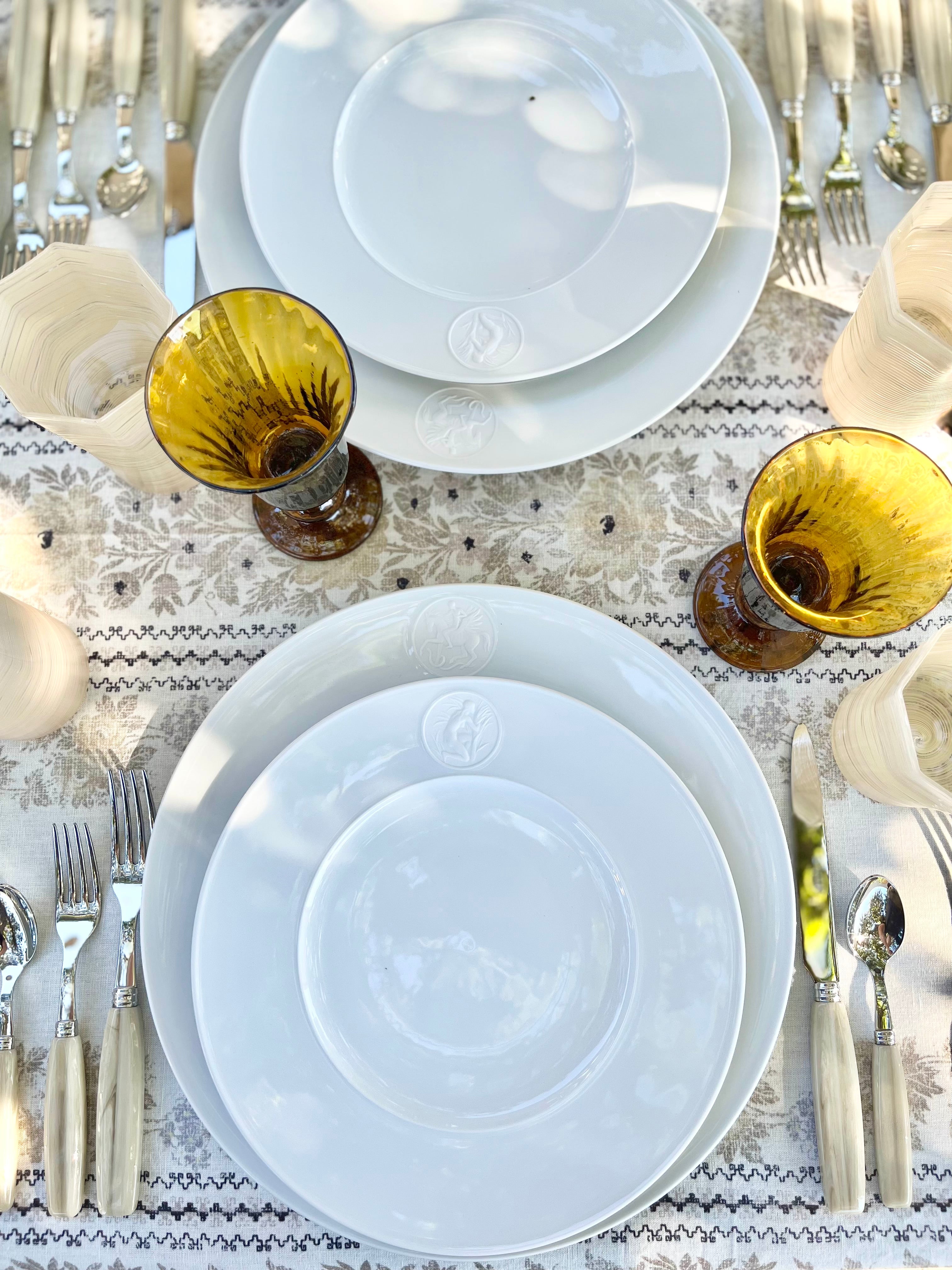 hand blown wine glass from gordiola in tobacco color place setting top view