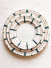 ceramic salad plate with teal stripes around edge with dinner plate and charger plate