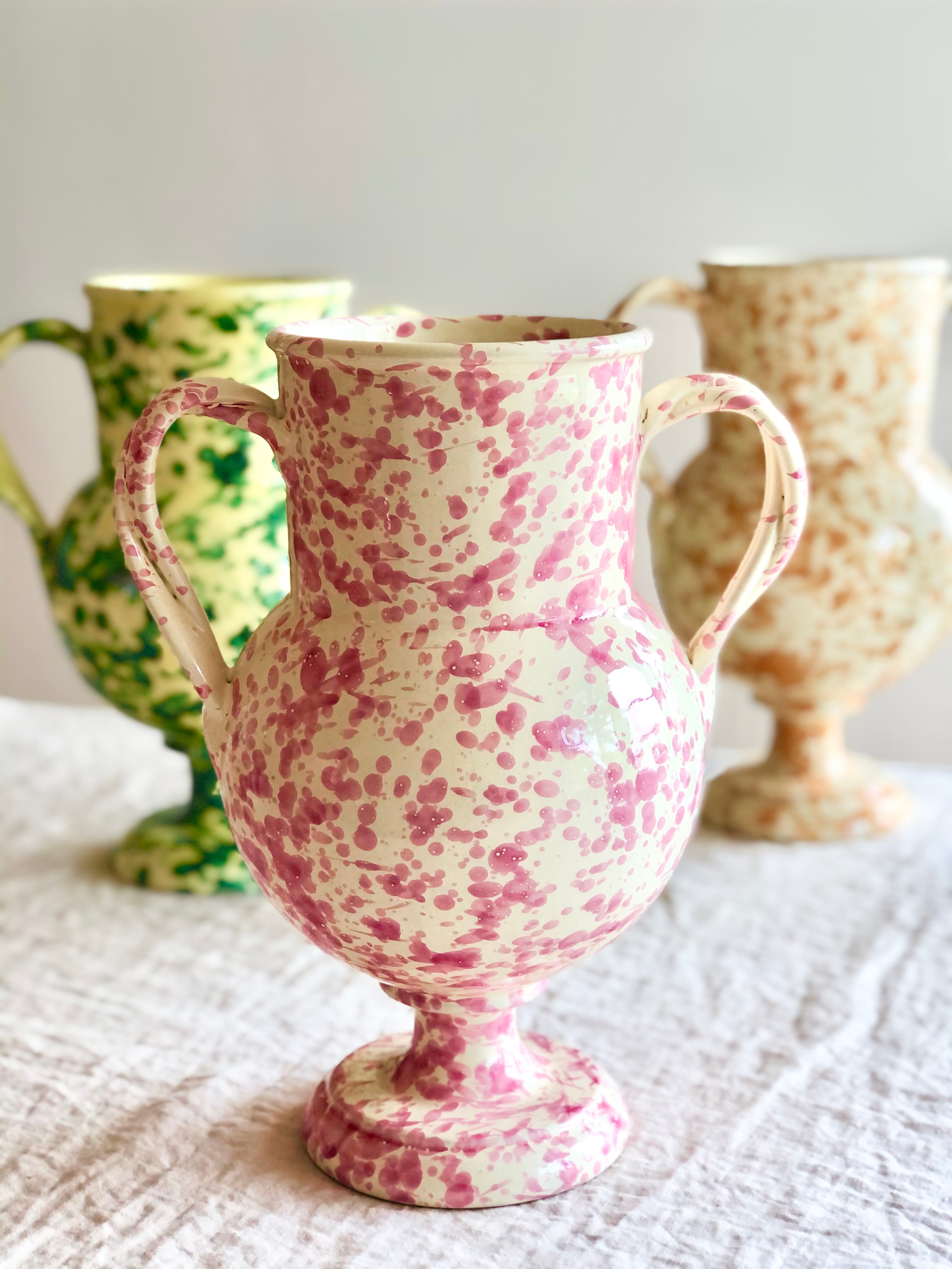 cream amphora vase with light brown speckle pattern 13 inches tall in group with other color options