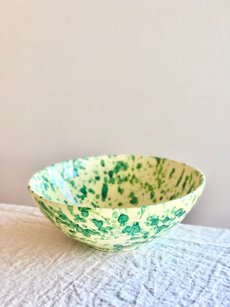 splatter pattern serving bowls in yellow and green color 13 inch side view