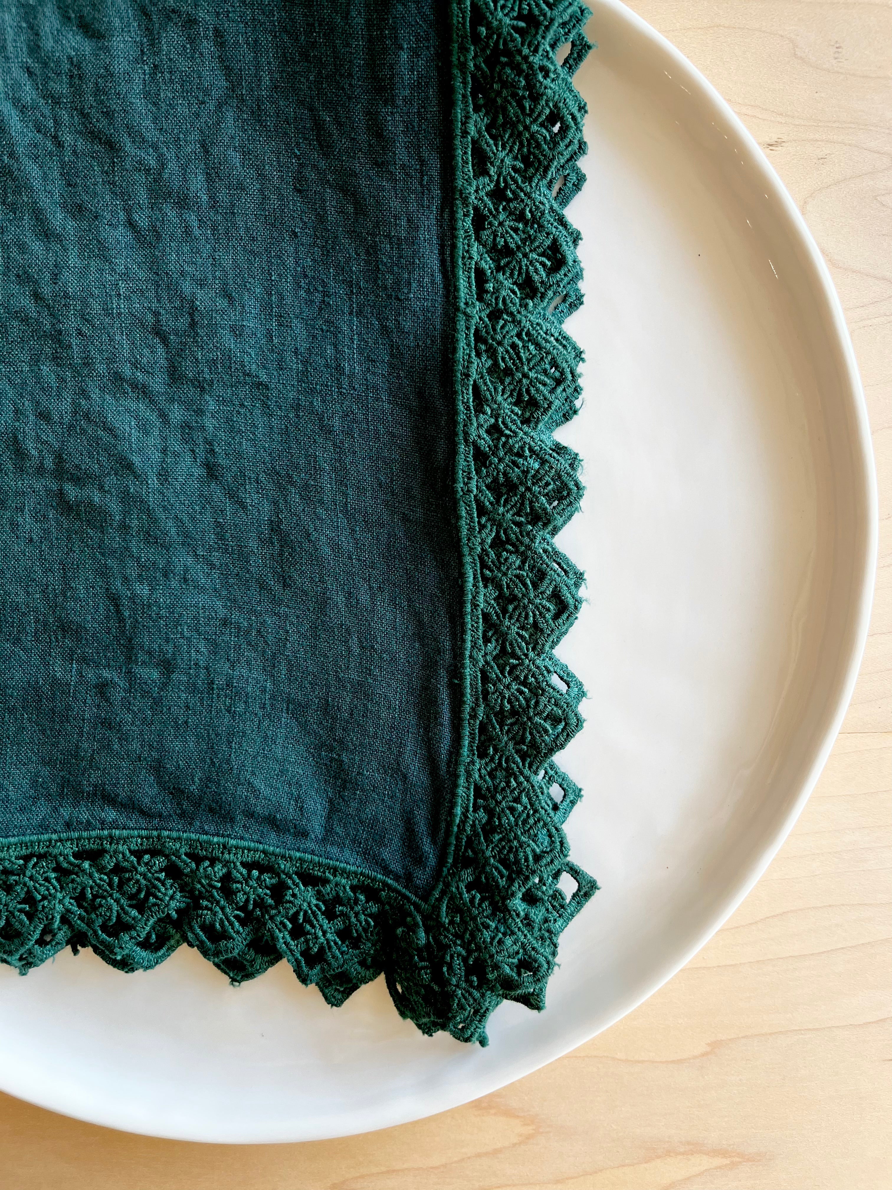 teal linen napkin with macrame trim
