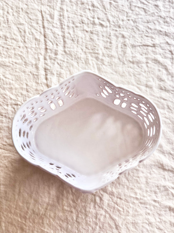 white ceramic bread basket made of french faience top view