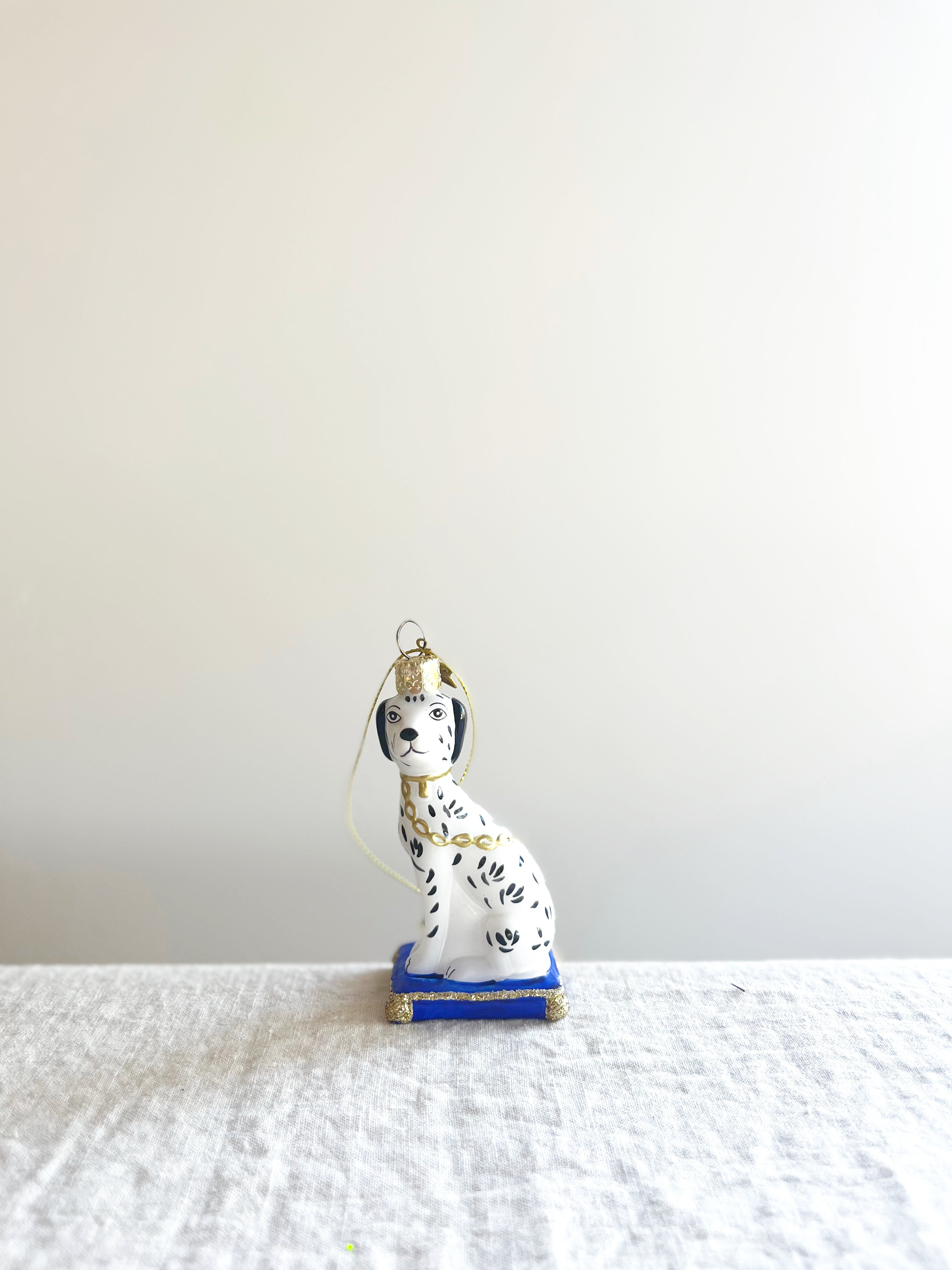 glass christmas ornament shaped like dalmation dog