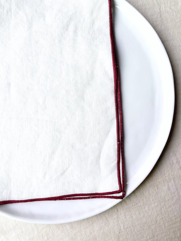 white rolled edge linen napkins with burgandy edge 18 inch square