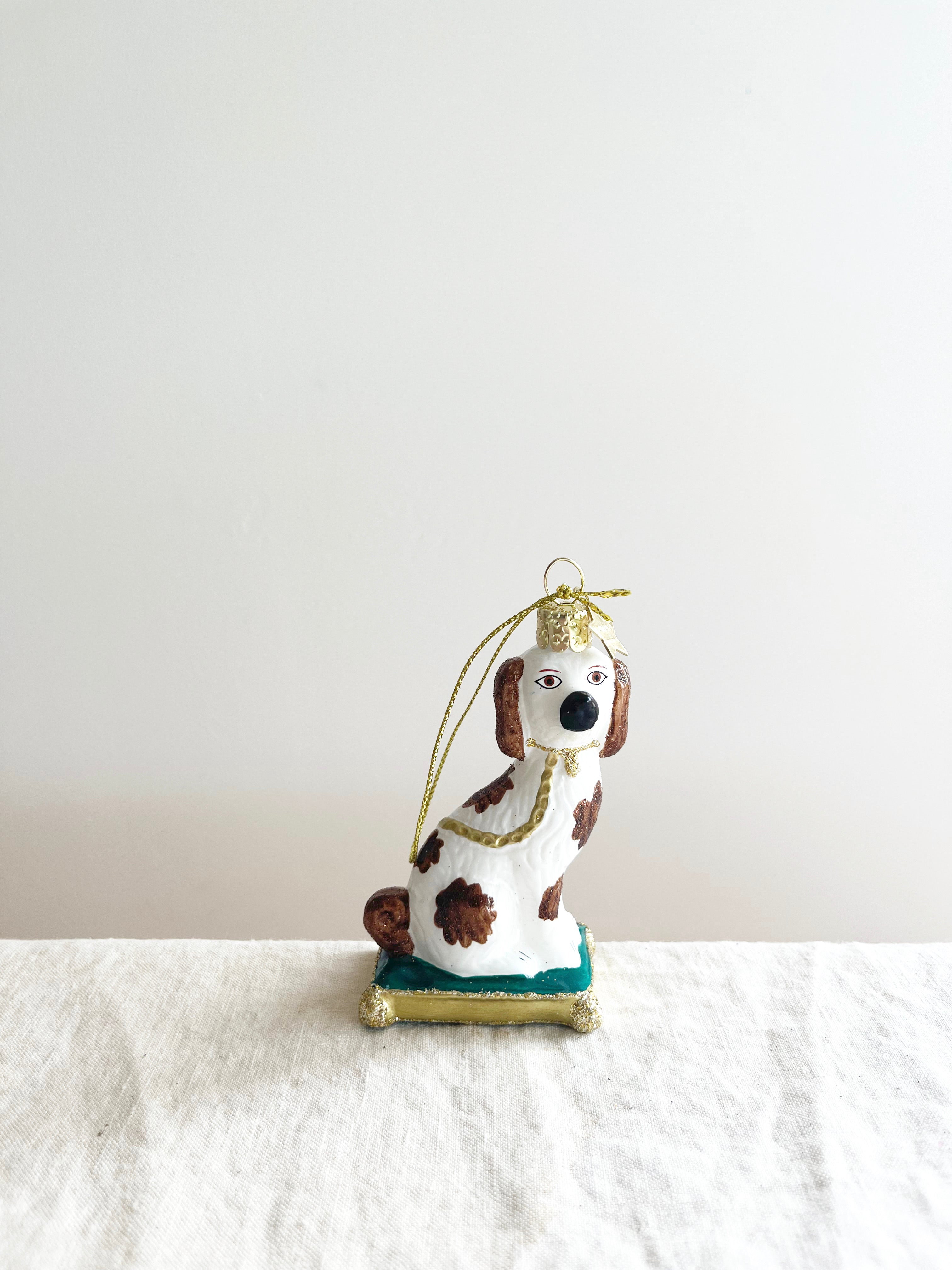brown and white dog glass christmas ornament