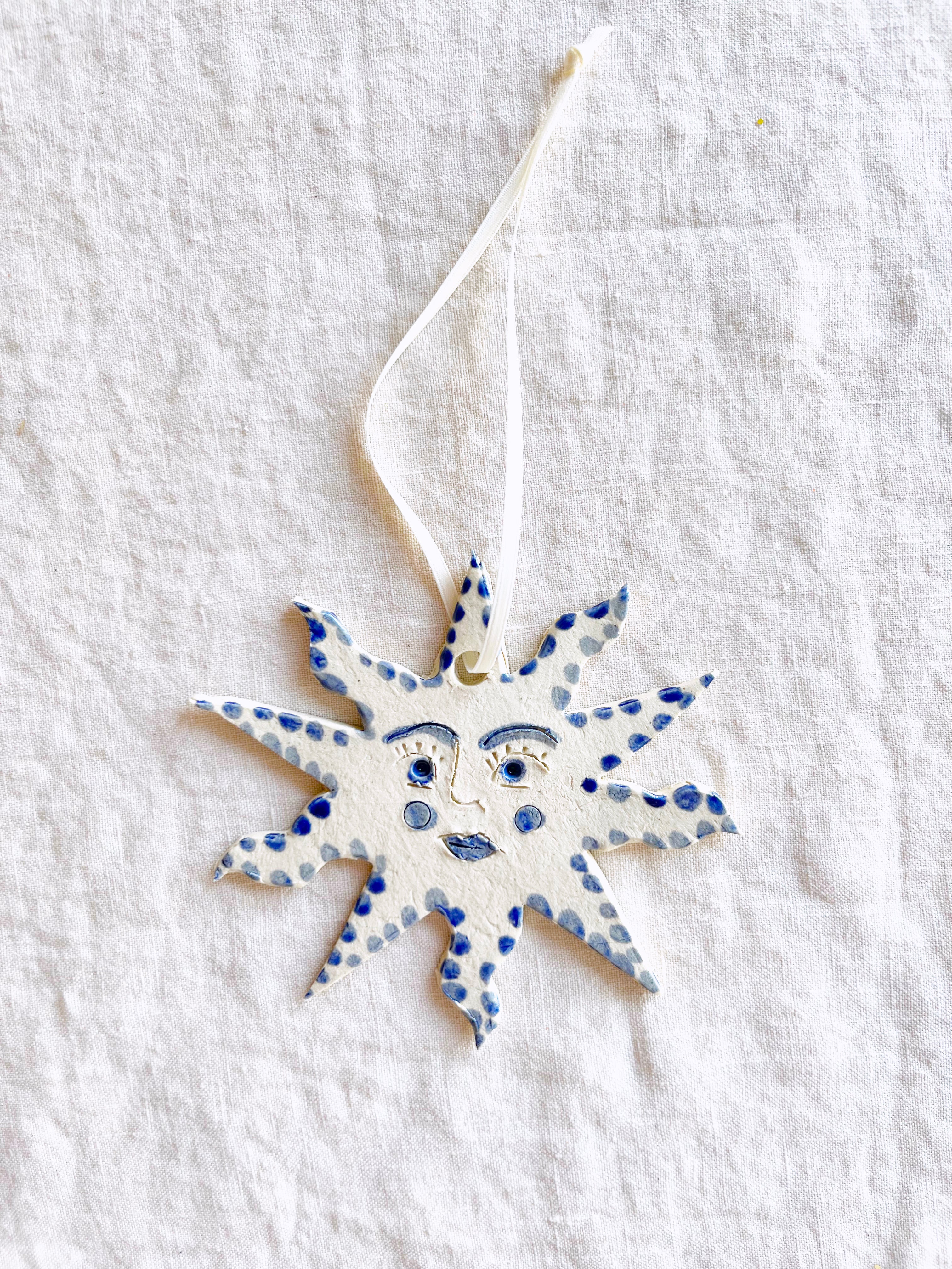 hand painted blue and white star christmas ornaments with white ribbon