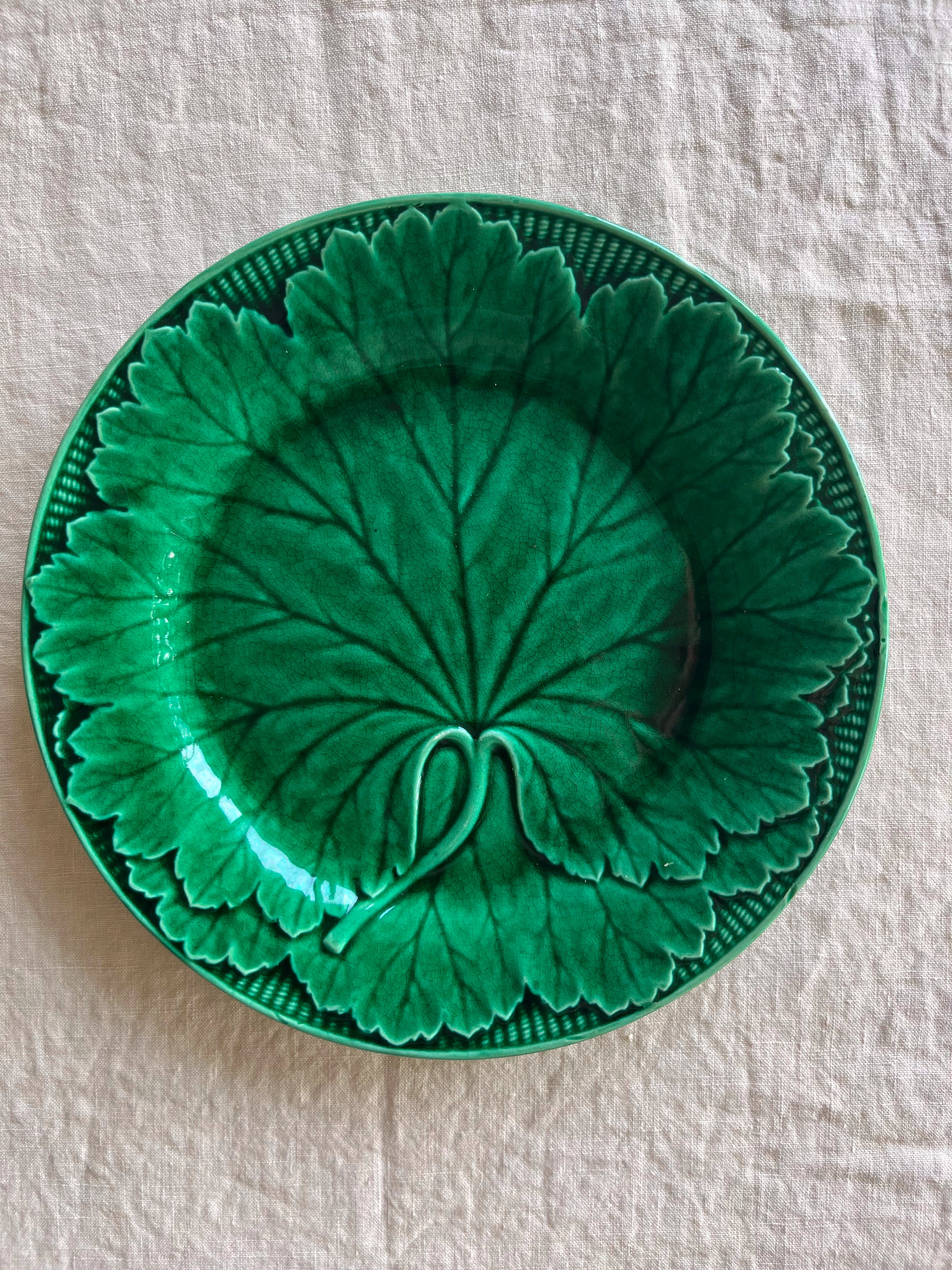 green wedgwood majolica plate in etruria pattern detail view