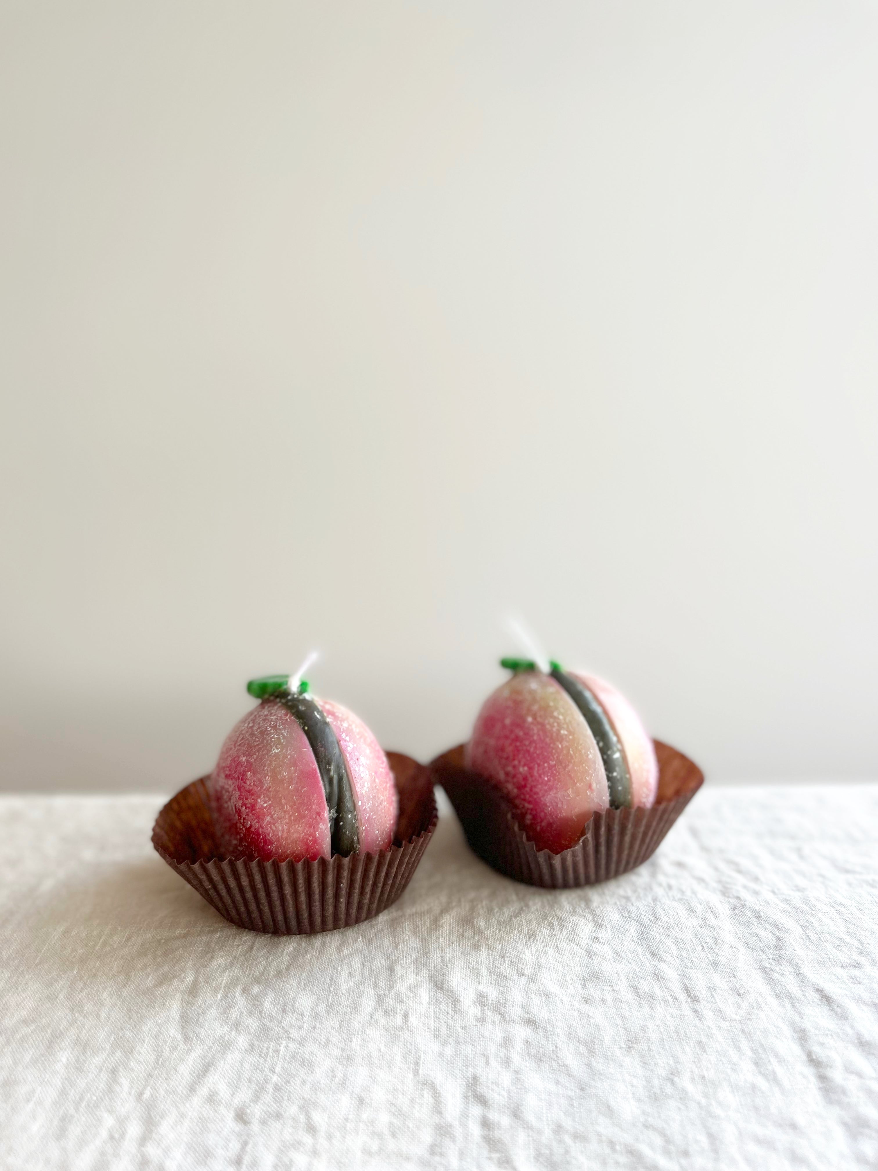 cereria introna sugared macaroon shaped paraffin candle group of two