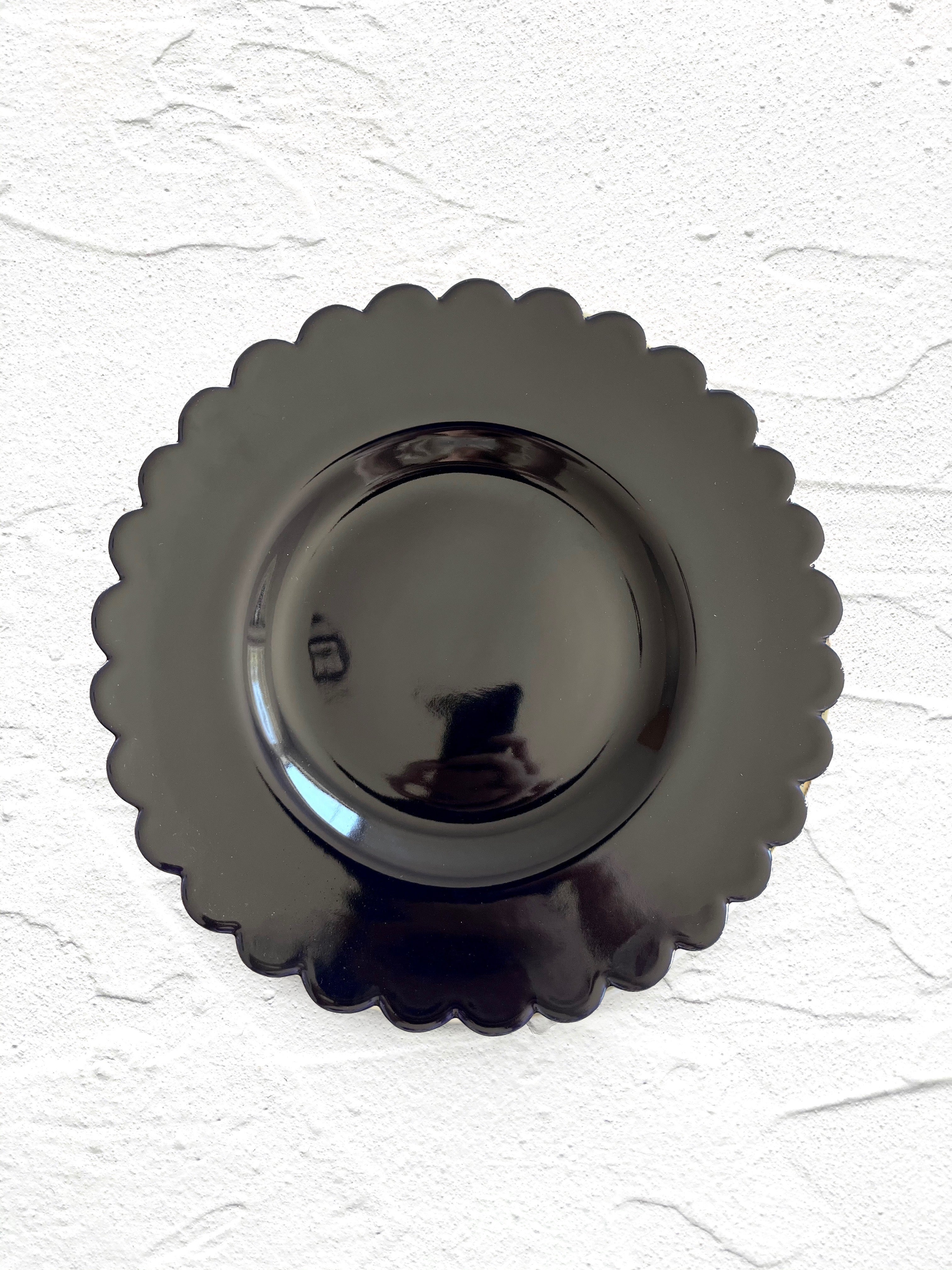 dark blue salad plate with scalloped edge