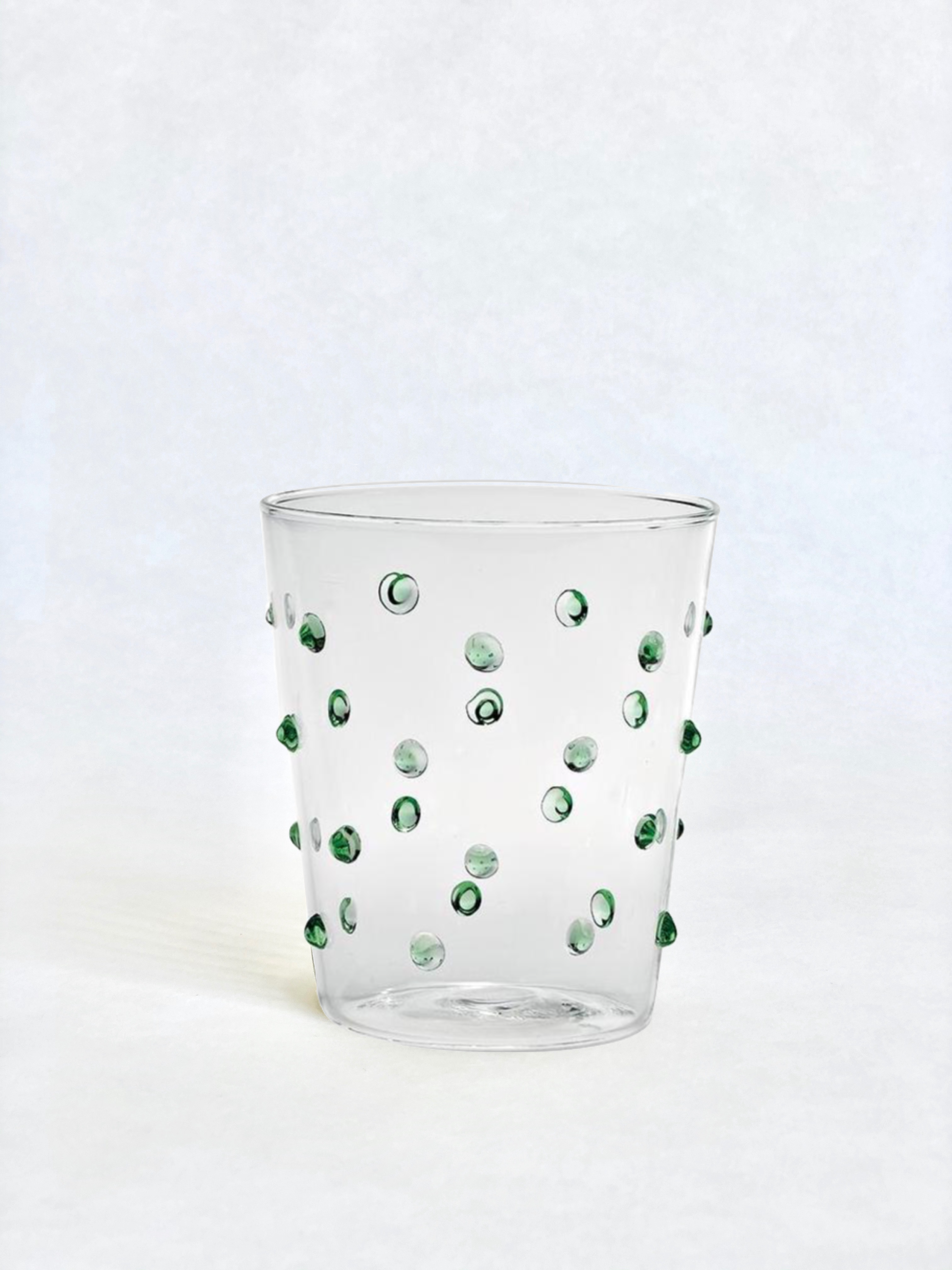 clear glass tumblers with green glass dots