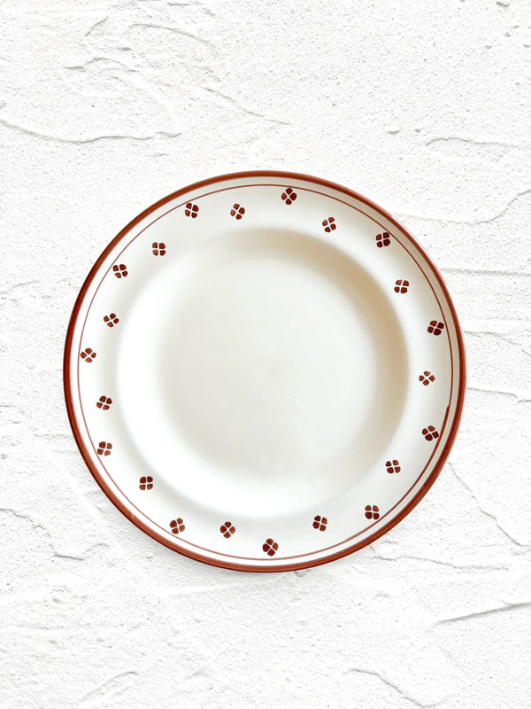 brown and white salad plate