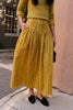 gold maxi skirt with dark gold melagrano stripe pattern waist detail