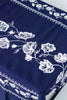 rectangular blue embroidered tablecloth with white flowers