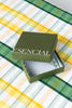 yellow, green and white plaid rectangular tablecloth with brand logo