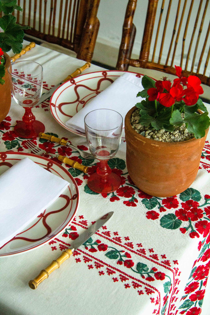 rectangular white embroidered tablecloth with red flowers with geranium