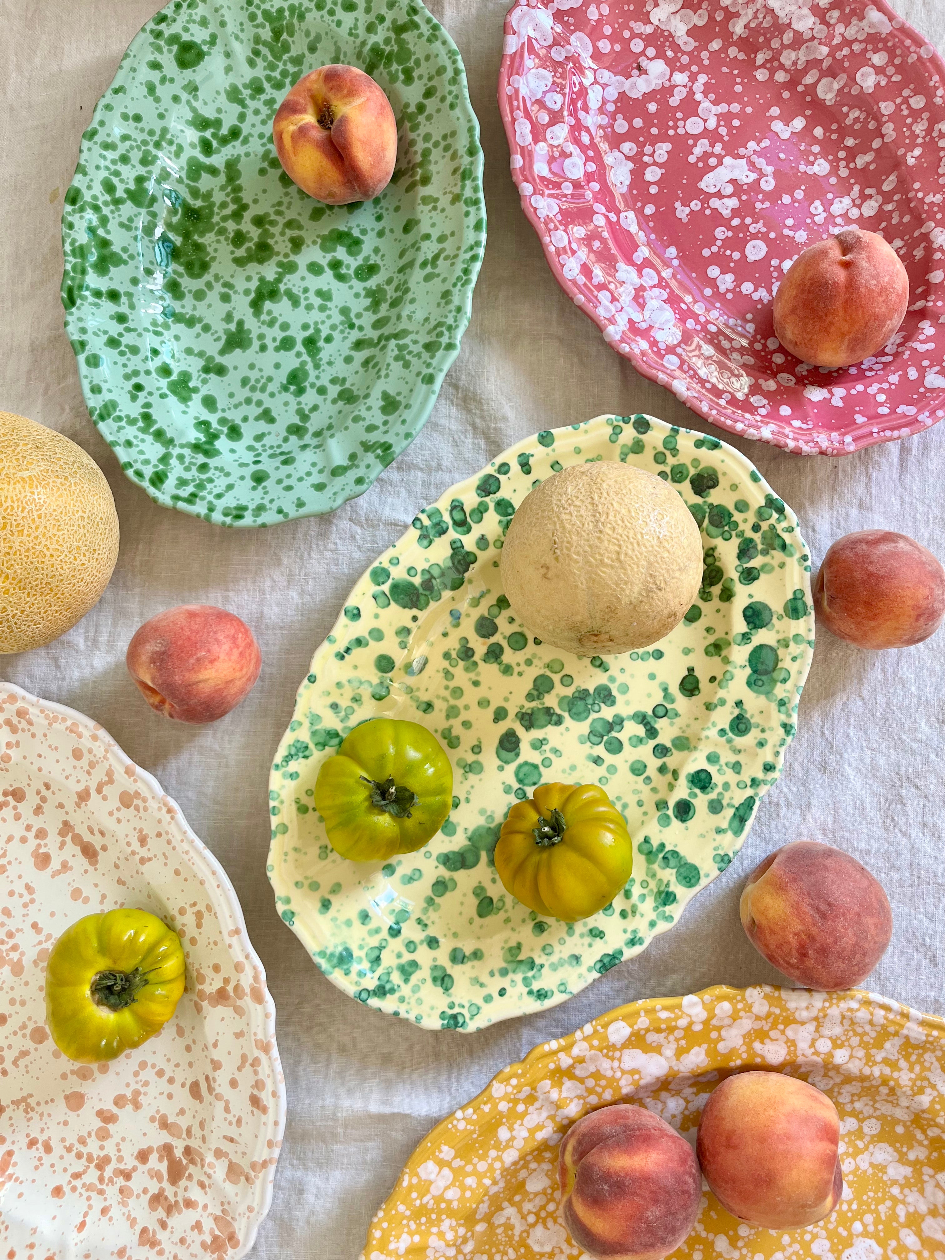 pink and white oval spatterware platter 14" with other colors