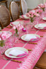 rectangular pink and white eyelet tablecloth in tablescape