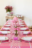 rectangular pink and white eyelet tablecloth with flowers