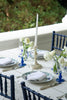 rectangular white eyelet tablecloth with candles