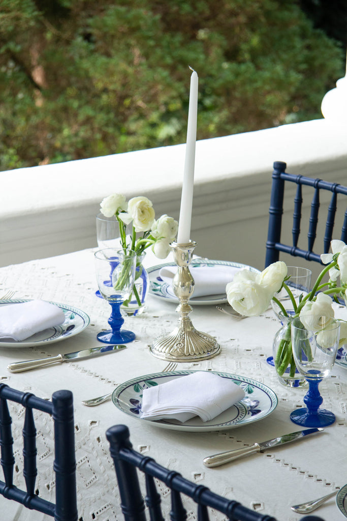 rectangular white eyelet tablecloth with candles