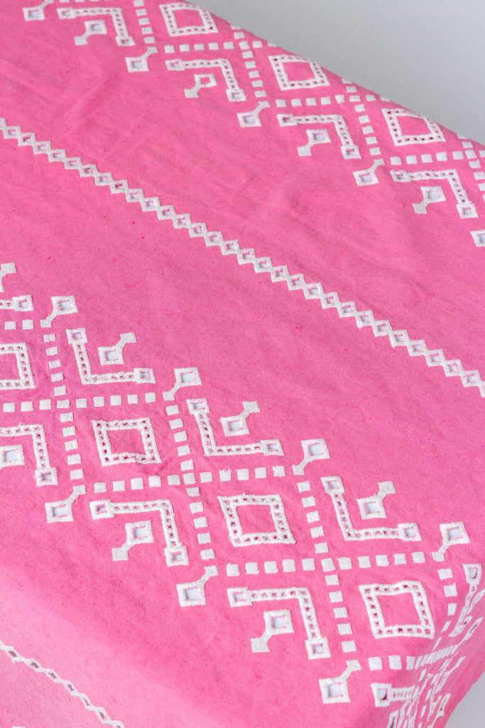 rectangular pink and white eyelet tablecloth