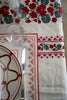 rectangular ivory and red embroidered placemat stitching detail